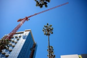 Construction work is done on a new building on South First St. and East Reed Street in downtown San Jose, Calif., on Thursday, May 16, 2024