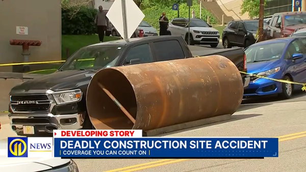 Woman killed when large steel cylinder escapes construction site